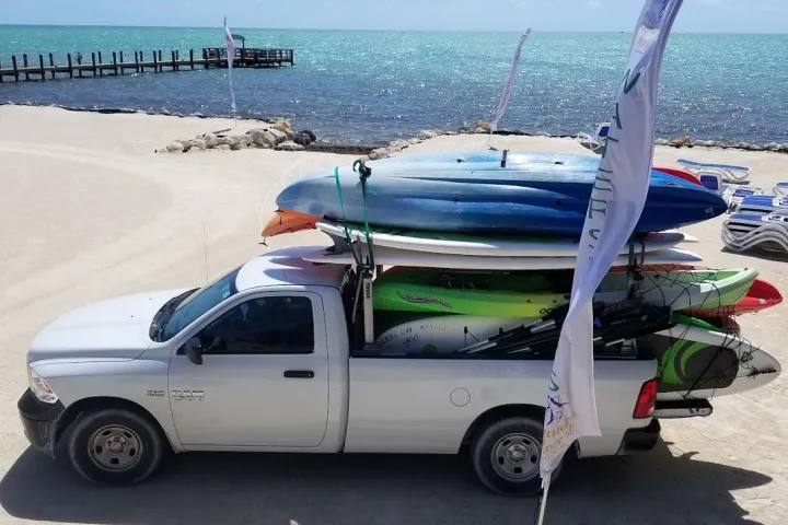 Delivery truck filled with kayaks for multi day rentals