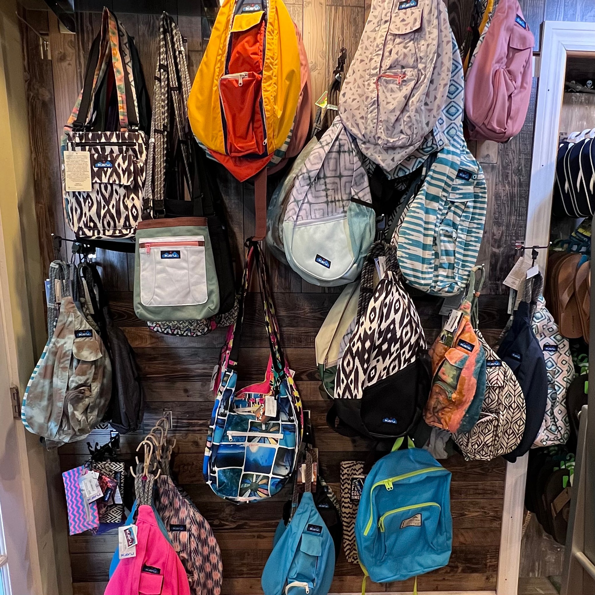 a person holding a bunch of items that are on display