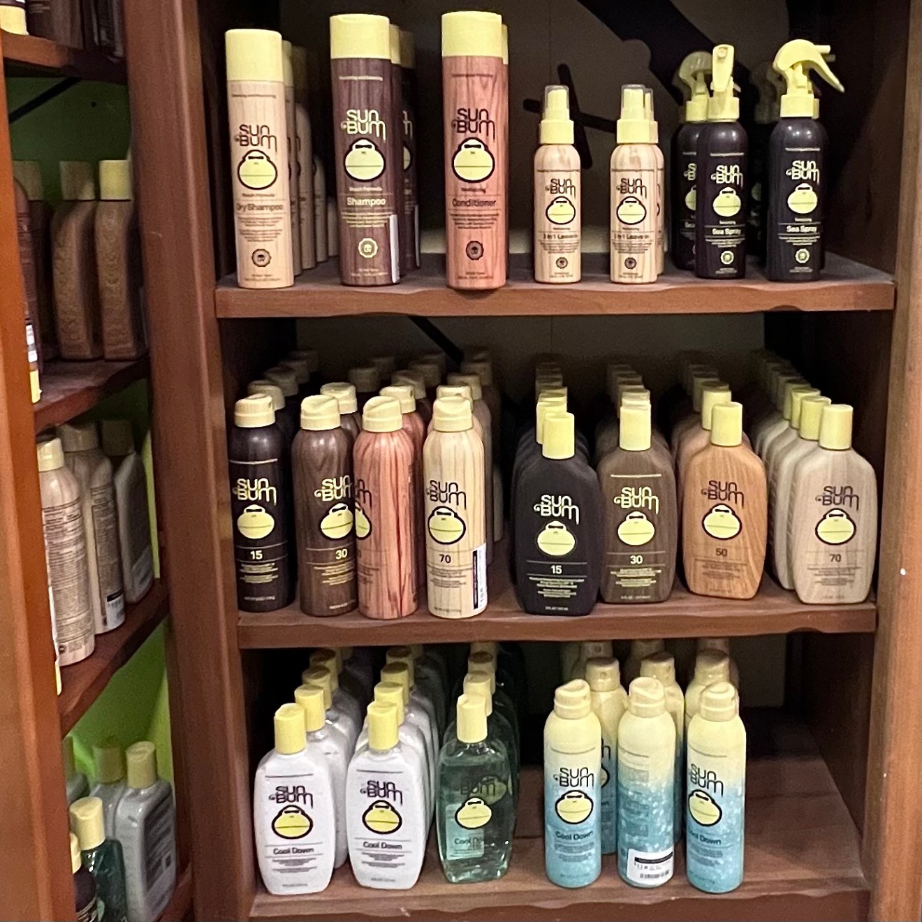 a row of beer glasses on a shelf